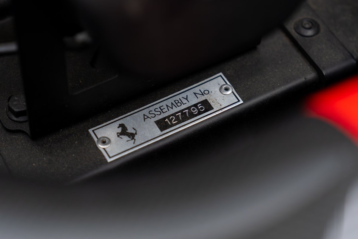 Close-up of a 2015 Ferrari 458 Speciale's assembly number plate.