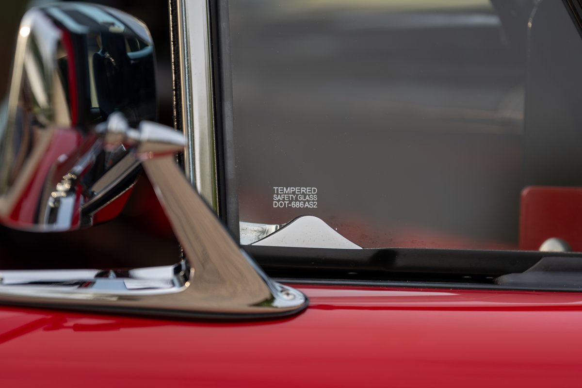 1966 Ford Bronco door with chrome mirror. Red paint and tempered safety glass.