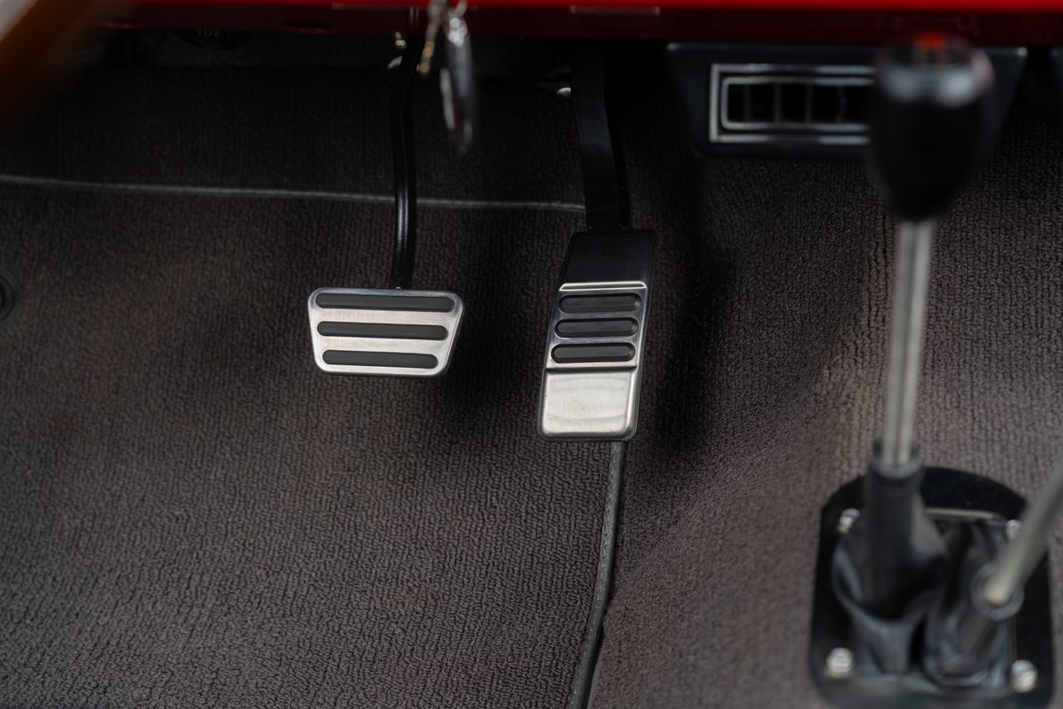 1966 Ford Bronco pedals with custom trim, and shifter.
