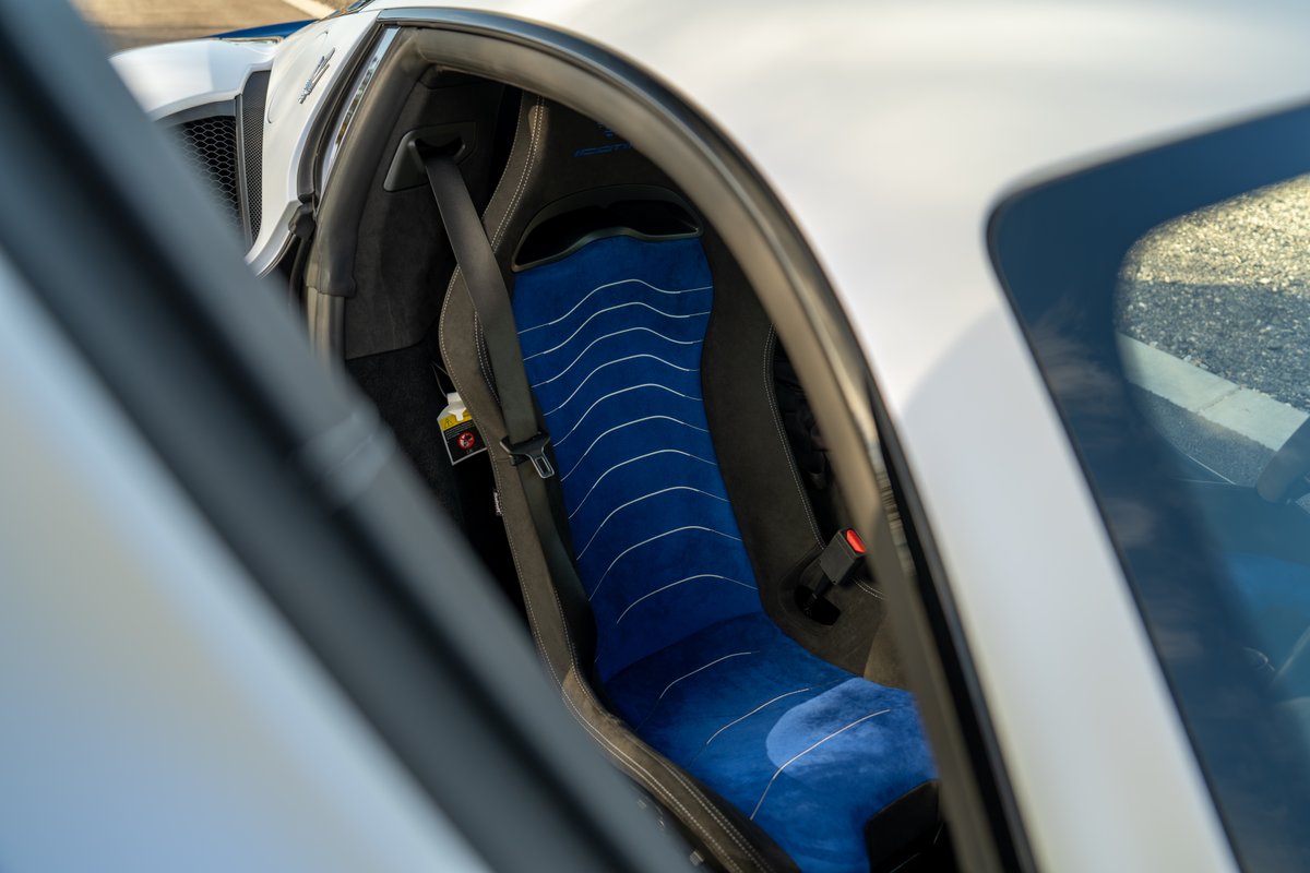 2024 Maserati MC20 Icona interior: blue suede racing seat with white stitching.