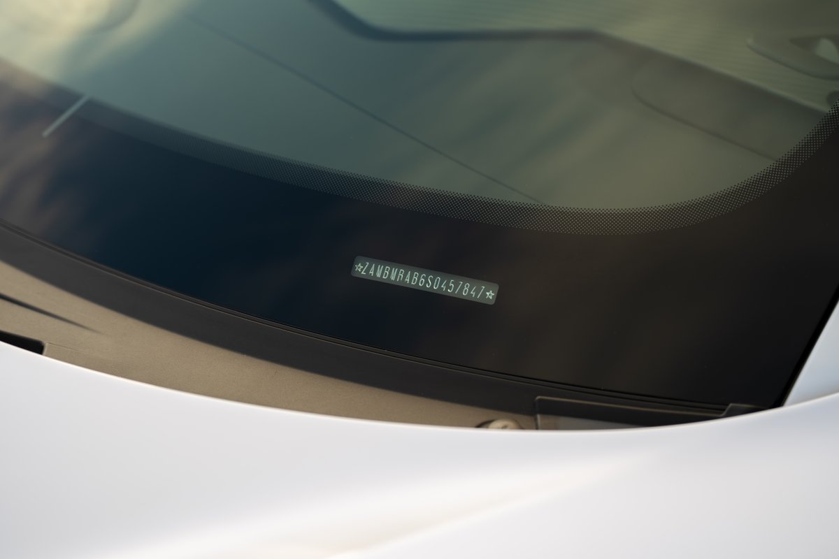 2024 Maserati MC20 Icona VIN sticker on windshield.
