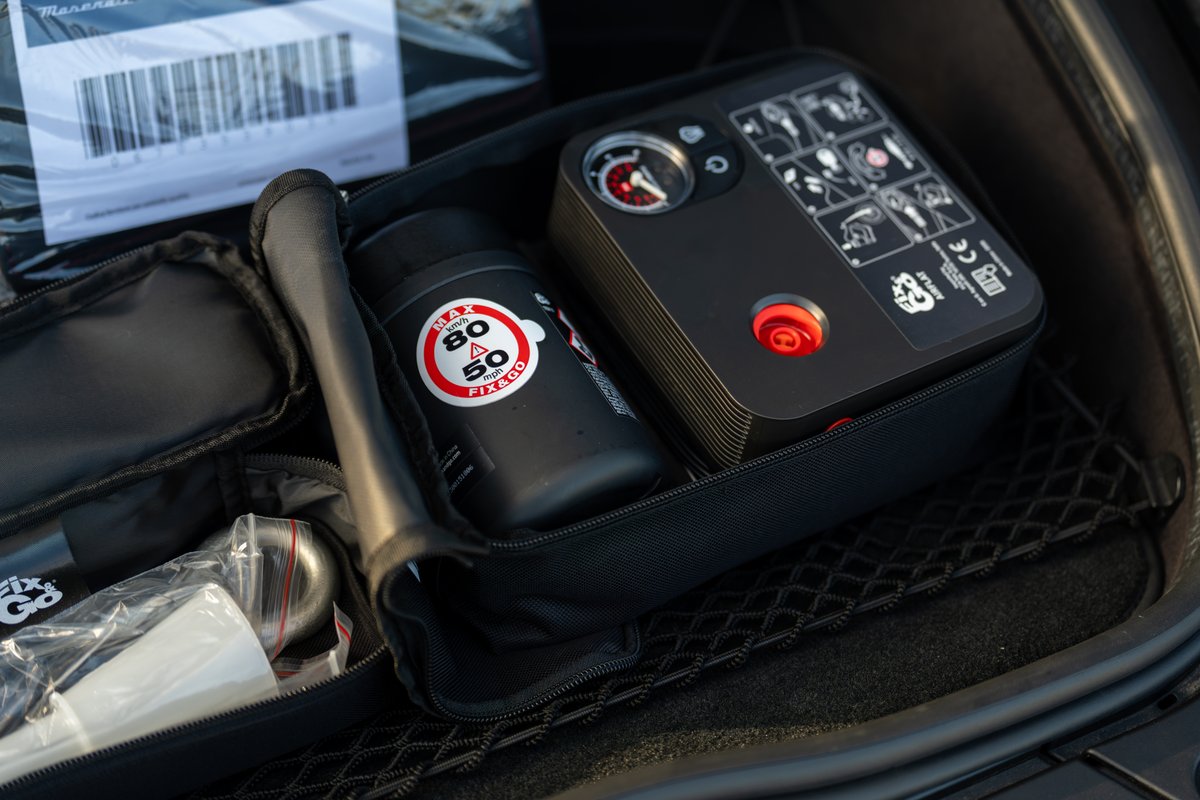 2024 Maserati MC20 Icona trunk contents: Fix & Go tire repair kit and Maserati manual.