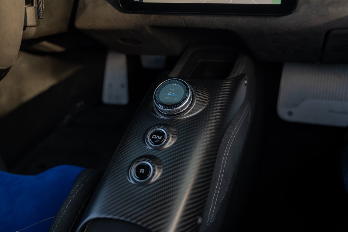 Maserati MC20 Icona interior: carbon fiber trim, drive mode selector, D/M, and R buttons.