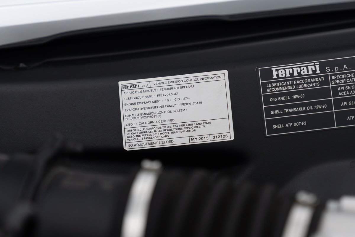 Ferrari 458 Speciale vehicle emission control sticker.