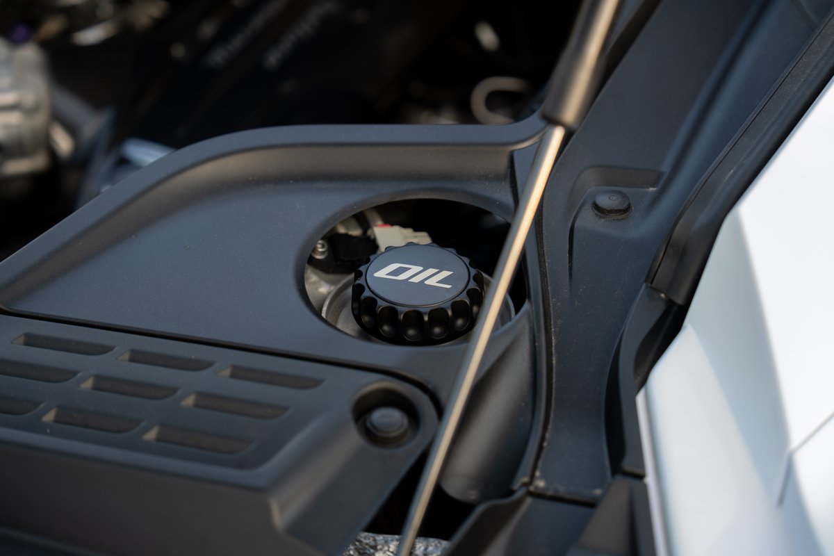 2024 Maserati MC20 Icona engine bay with black "OIL" cap.