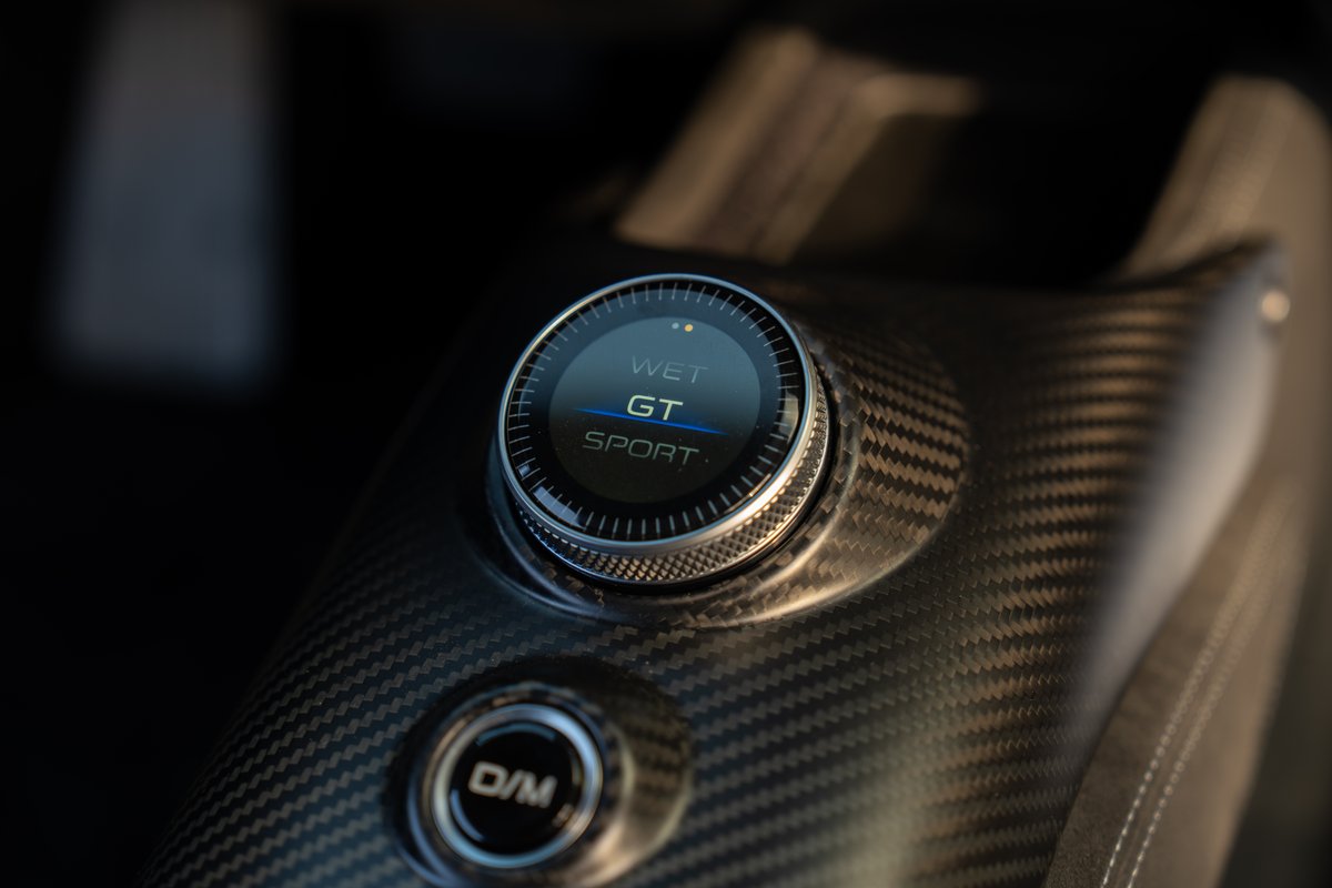 Maserati MC20 Icona interior carbon fiber trim with GT drive mode selector.