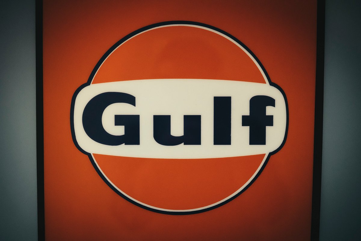 Iconic Gulf racing logo: orange, white & dark blue. Key graphic for legendary car liveries at the LA show.
