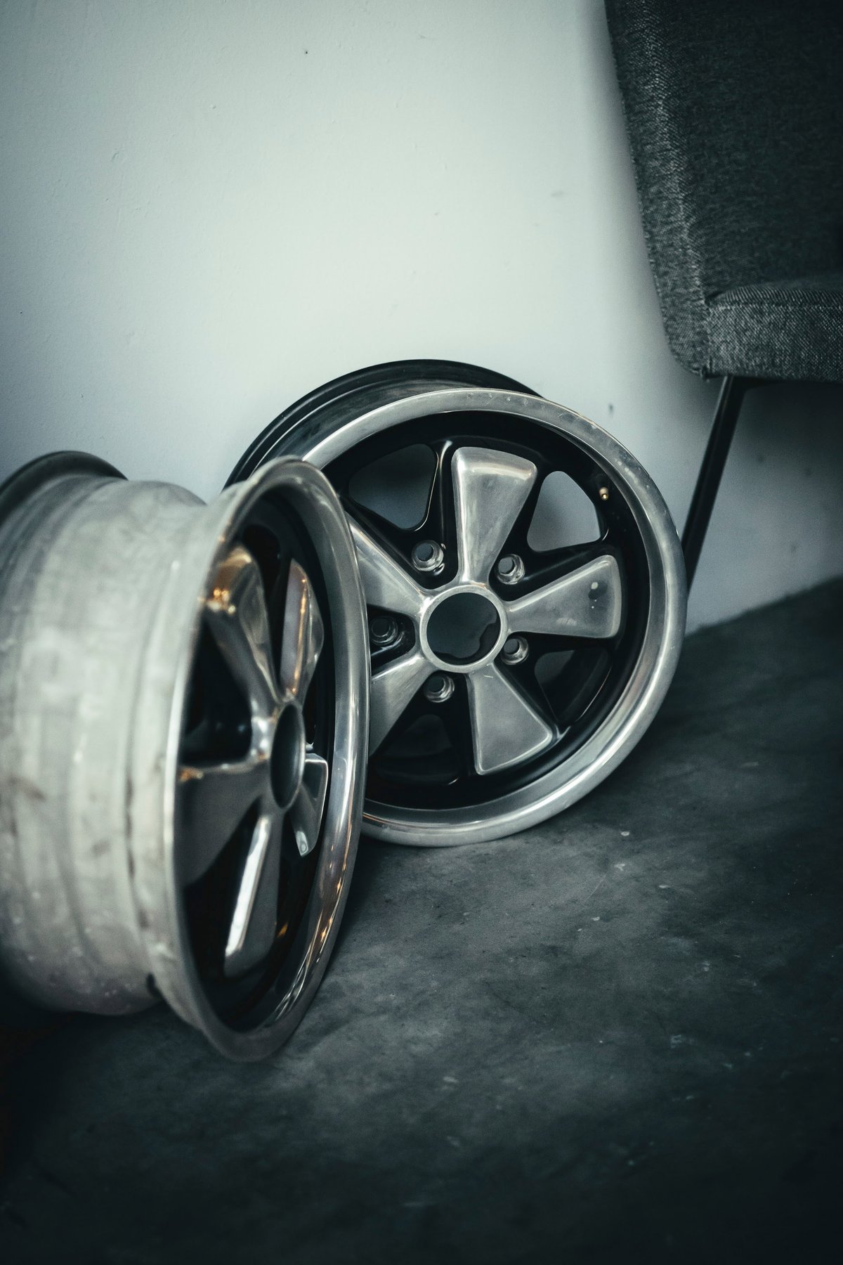 Pair of classic Porsche 911 Fuchs wheels, polished silver with black accents, from Lit Show LA.