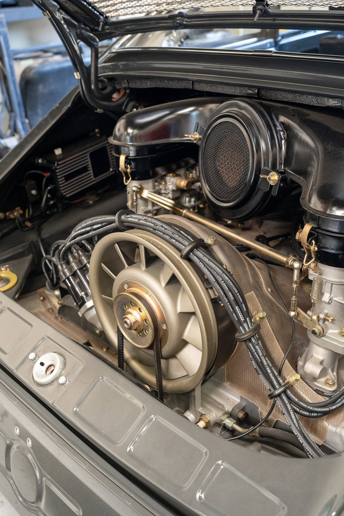 1974 Porsche 911 Carrera 3.0 engine bay with Weber carburetors.