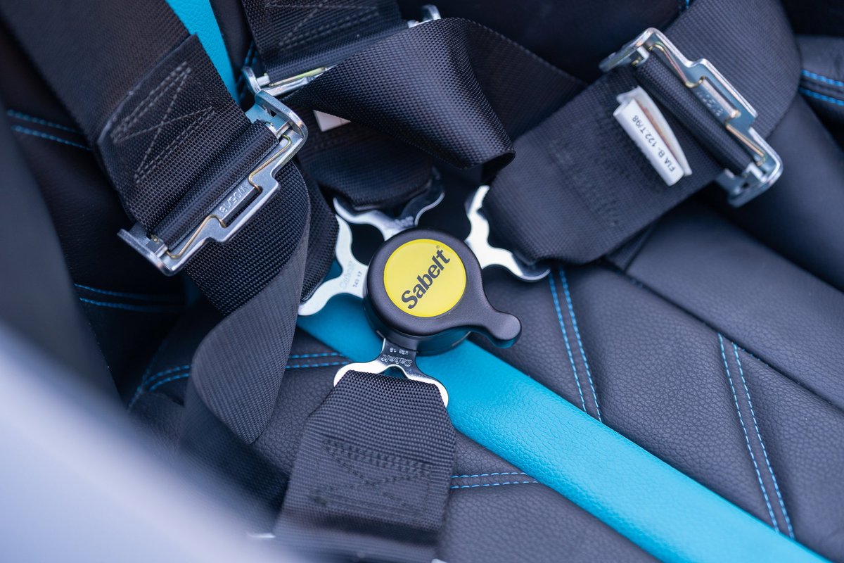 Backdraft Cobra iconic 427 with black leather seats and blue racing harness.