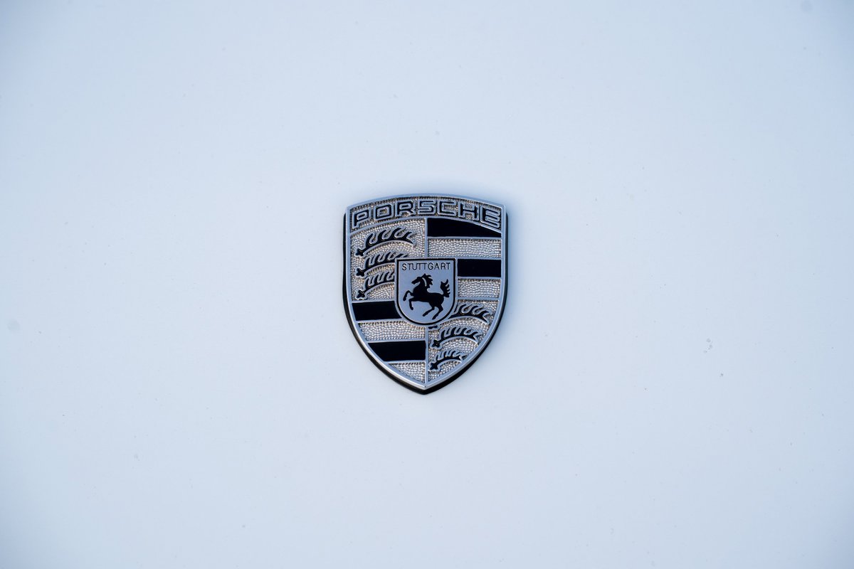 1997 Porsche 911 (993) C4S glacier white hood emblem.