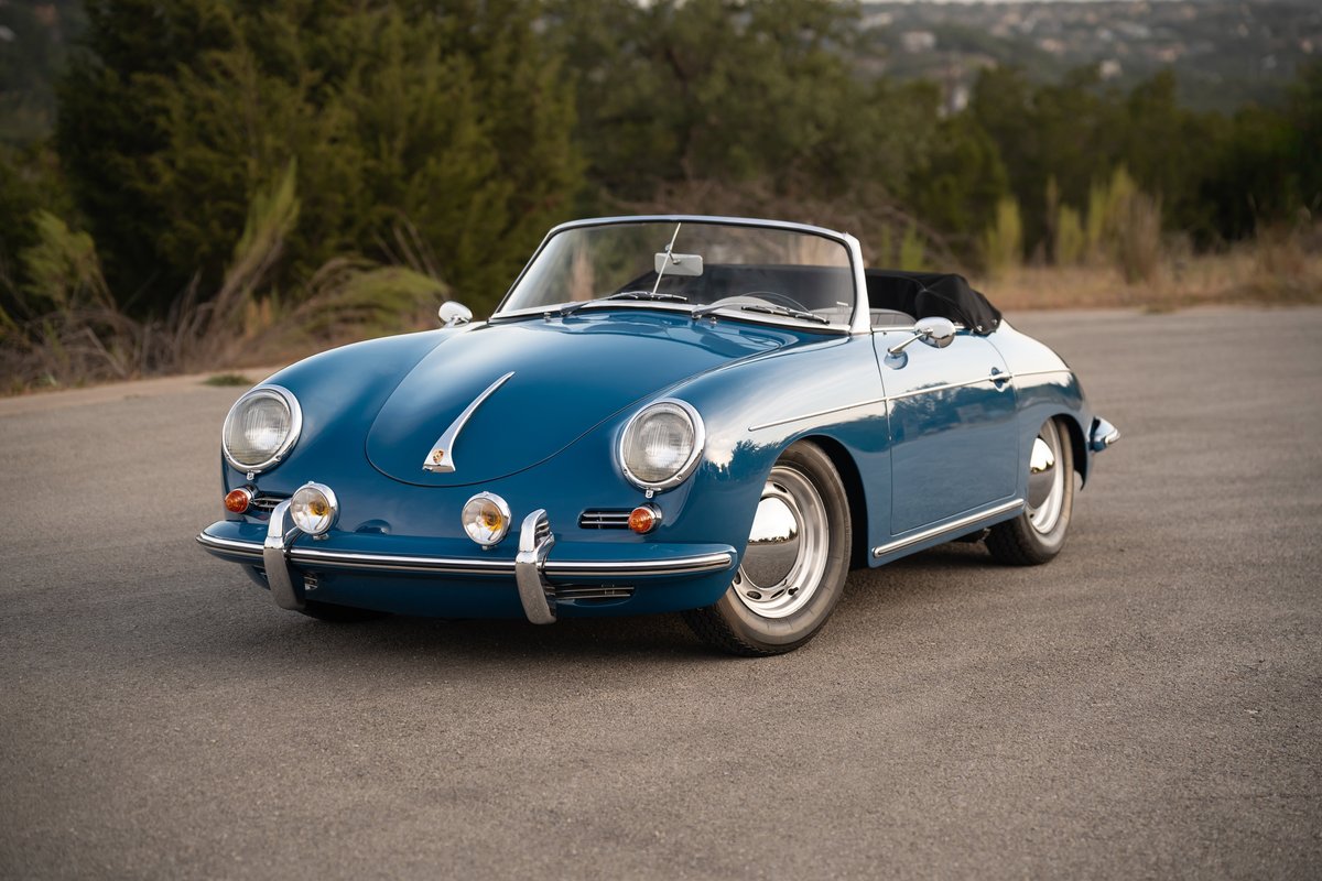 1960 Porsche 356B Roadster in Royal Blue, featuring chrome rims and trim.