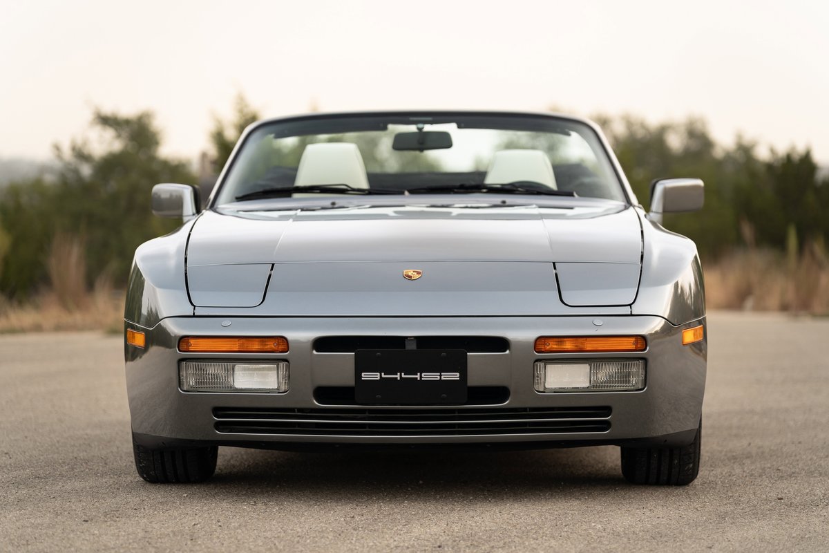 Front view of a silver 1990 Porsche 944 S2 Cabriolet.