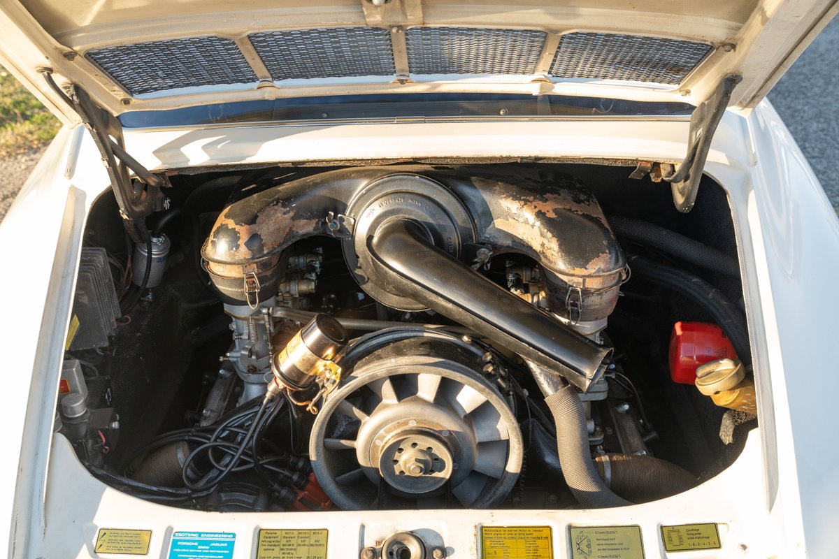 1970 Porsche 911T coupe engine bay, showing twin Weber carburetors & air-cooled flat-six.