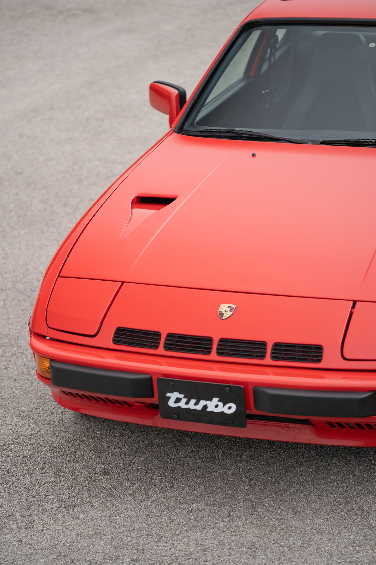 Red 1981 Porsche 924 Turbo front detail.