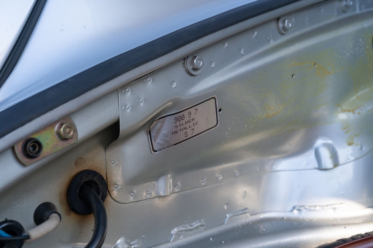 1987 Porsche 911 Carrera G50 in Silver Metallic paint code 97. VIN plate shown.