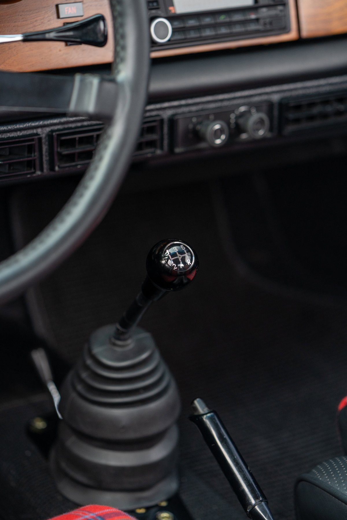 1967 Porsche 912 coupe interior detail, showing a 5-speed manual shifter.