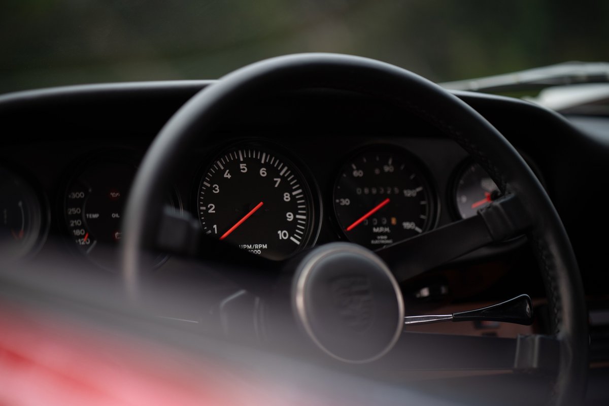 1967 Porsche 912 Coupe interior: tachometer, speedometer, and steering wheel.