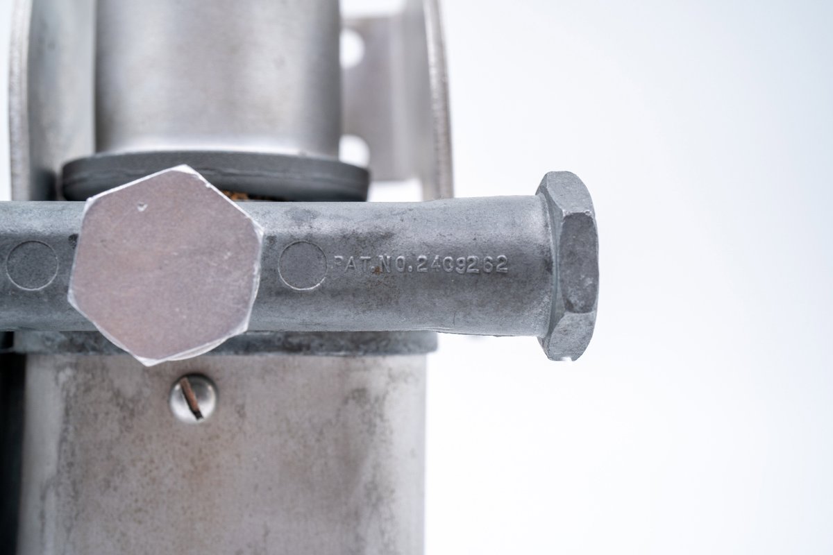 Close-up of a patent-stamped aluminum component on a new 550 Spyder.