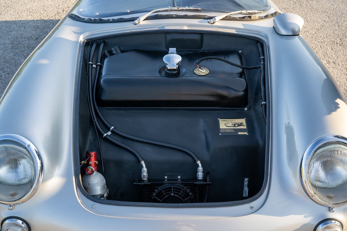 Silver Beck 550 Spyder front trunk with fuel tank, oil cooler, and fire suppression.