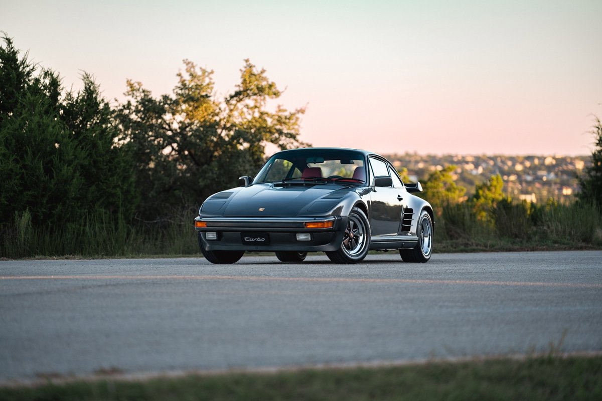 1989 Porsche 930 Turbo Flachbau in Slate Grey Metallic. Features period correct Fuchs rims.
