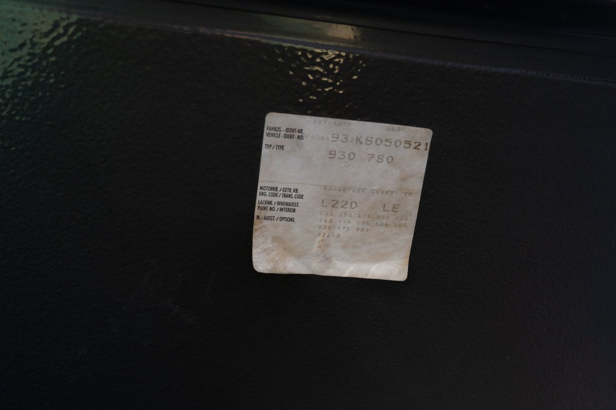 1989 Porsche 930 Turbo Flachbau VIN sticker, slate grey metallic paint, black trim.