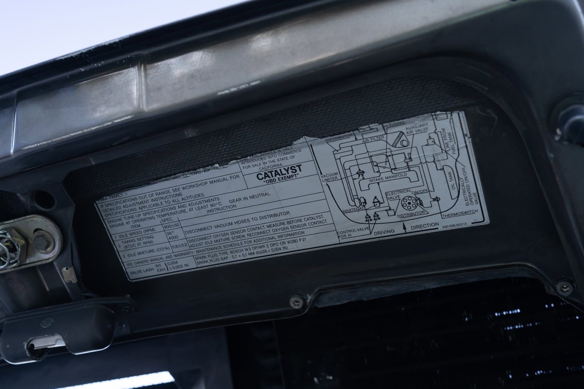 1989 Porsche 930 Turbo Flachbau emissions sticker under the hood.