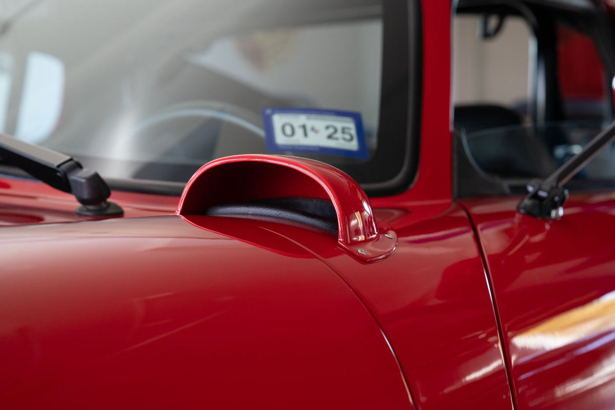 Red 1965 Superformance Shelby Daytona CSX hood scoop detail.