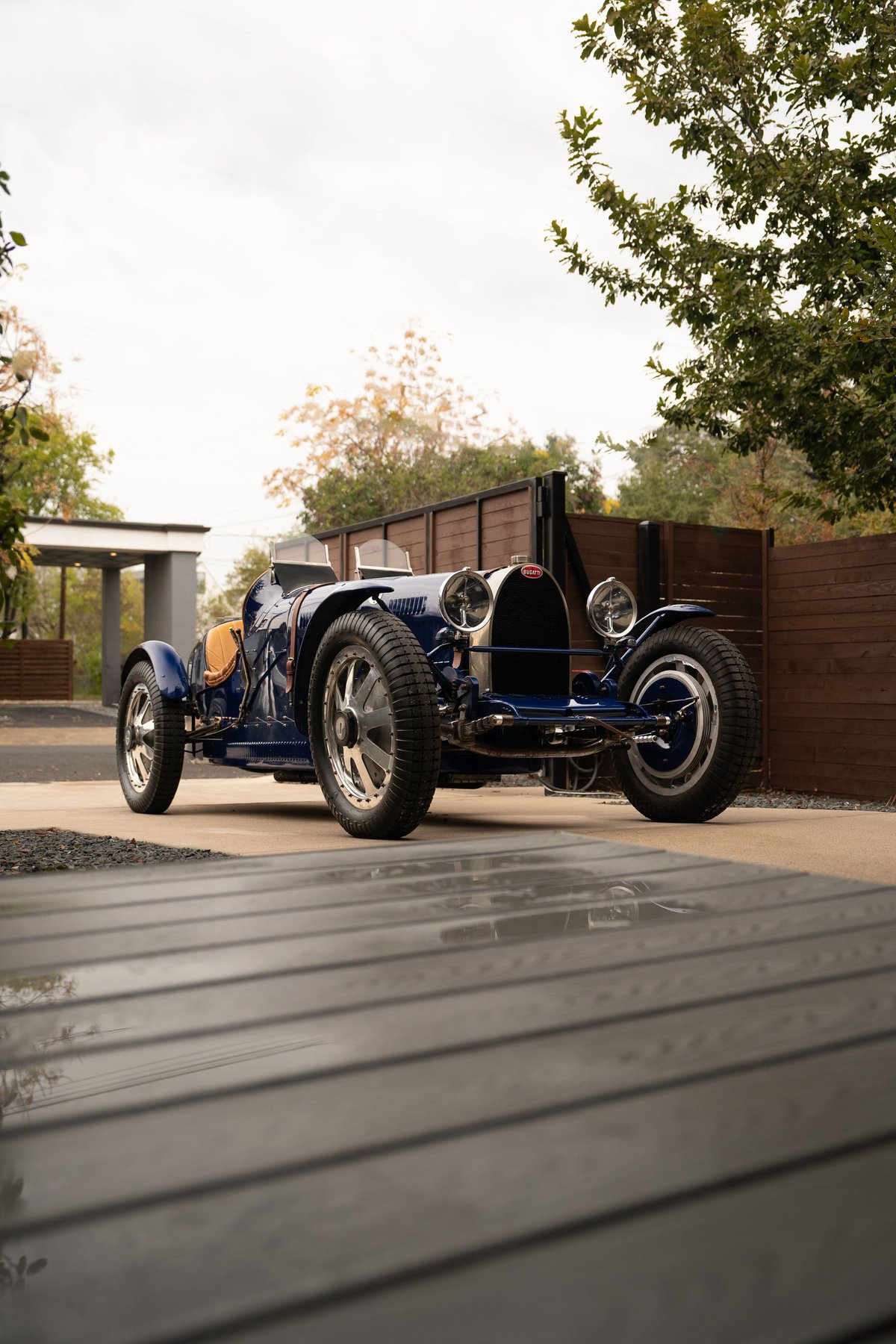 1927 Blue Bugatti Type 35 Pur Sang with spoked rims and leather trim.