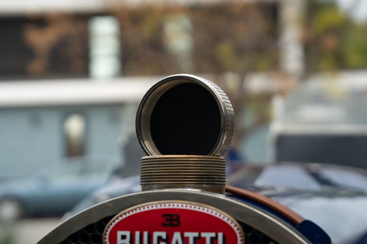 Bugatti Type 35 radiator cap on a blue 1927 Pur Sang.