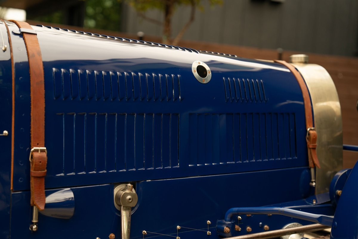 Blue 1927 Pur Sang Bugatti Type 35 hood detail with leather straps and vents.