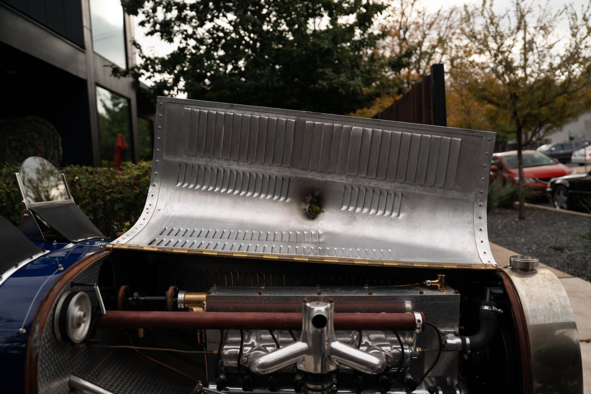 Blue 1927 Pur Sang Bugatti Type 35 engine and hood details.