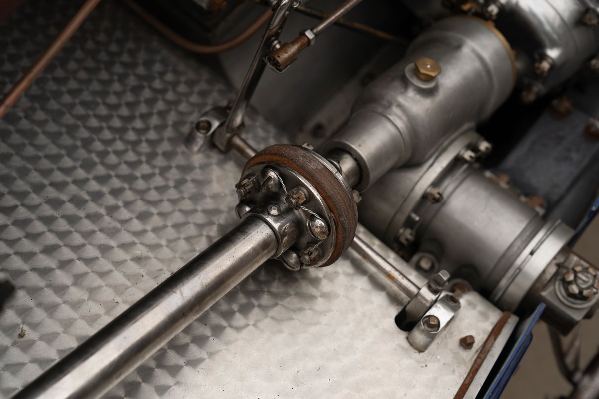 Close-up of the U-joint and driveshaft on a blue 1927 Bugatti Type 35 Pur Sang.