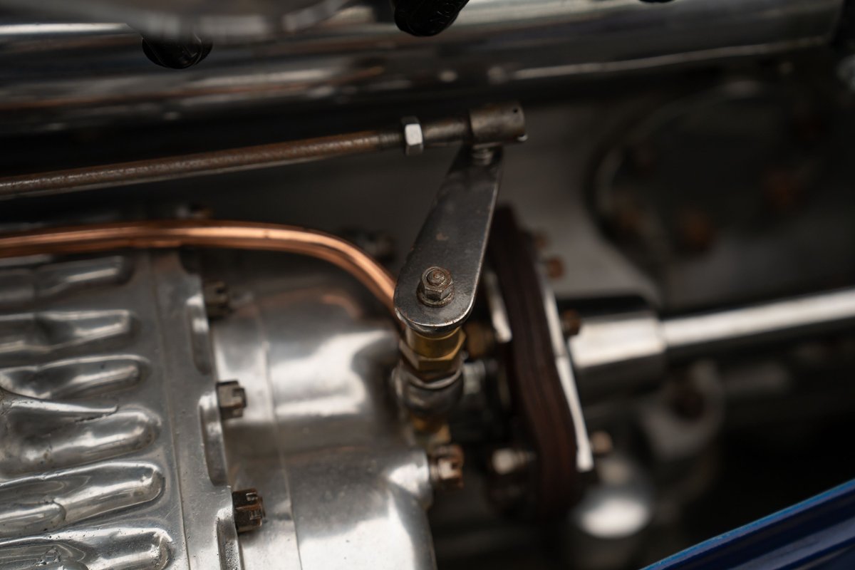 Bugatti Type 35 engine, polished aluminum supercharger and copper fuel lines.