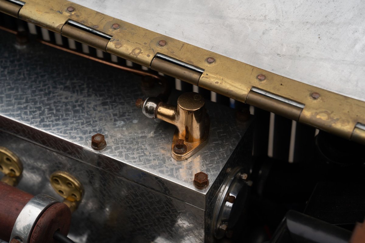 Detail of a brass valve on the engine block of a 1927 Bugatti Type 35.