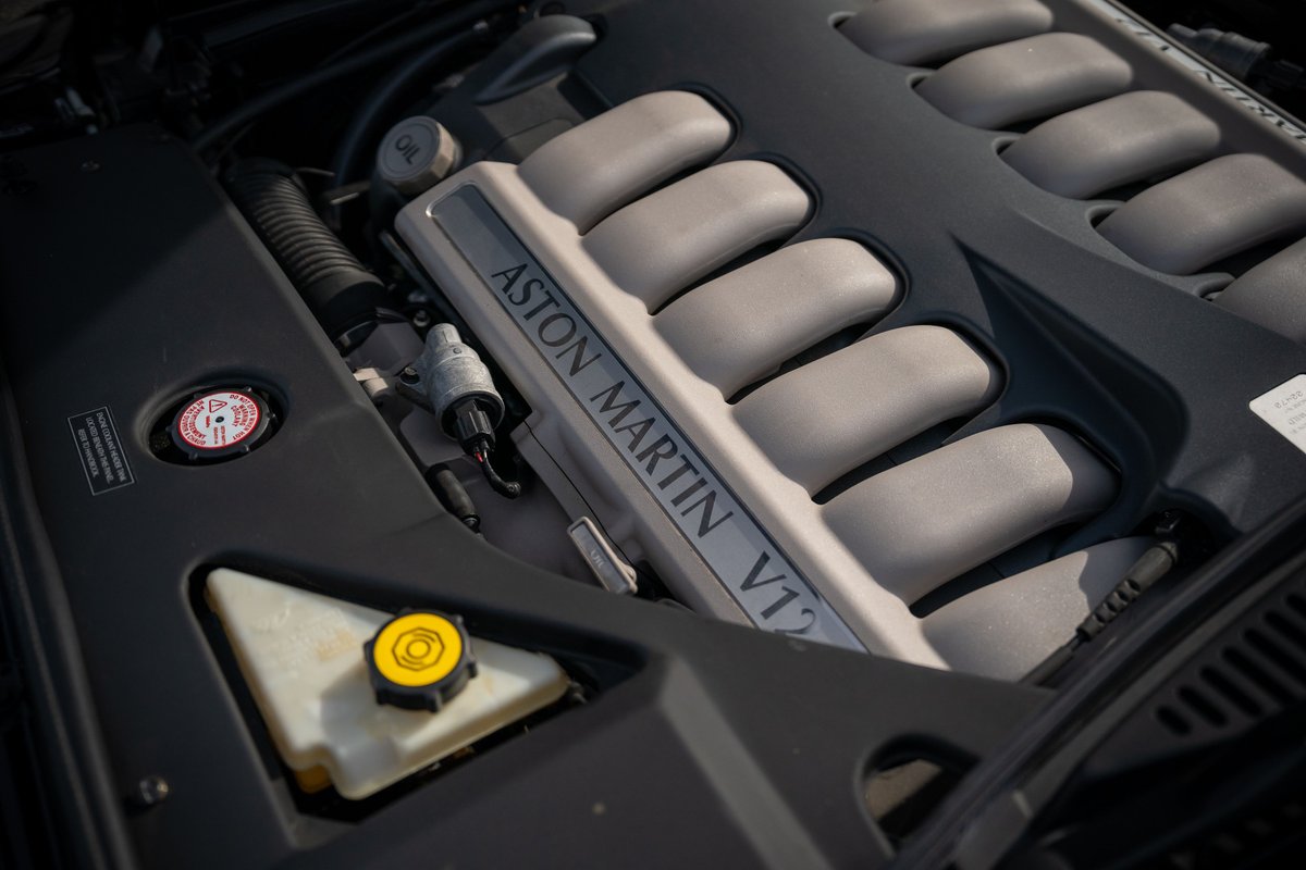 Close-up of the Aston Martin V12 engine in a black 2003 DB AR1 Zagato.