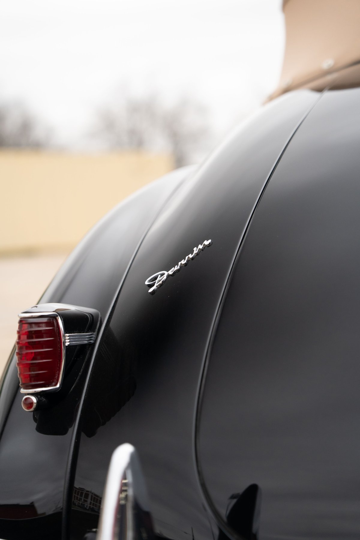1940 Packard Super Eight One Eighty convertible rear detail. Black paint with chrome trim.