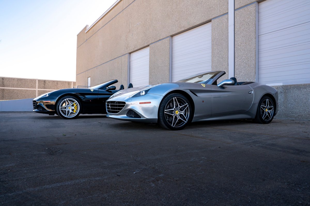 Silver 2016 Ferrari California T convertible with black accents and starburst rims.