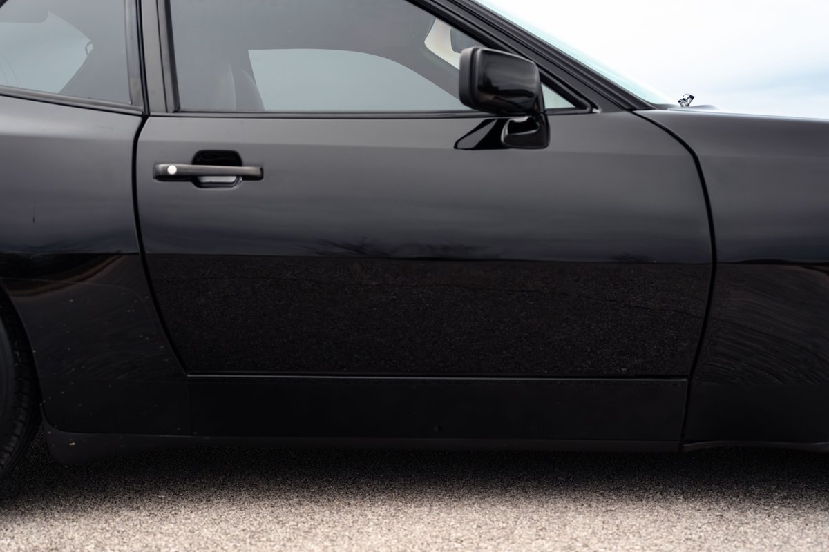 Black 1986 Porsche 944 Turbo door and side trim.