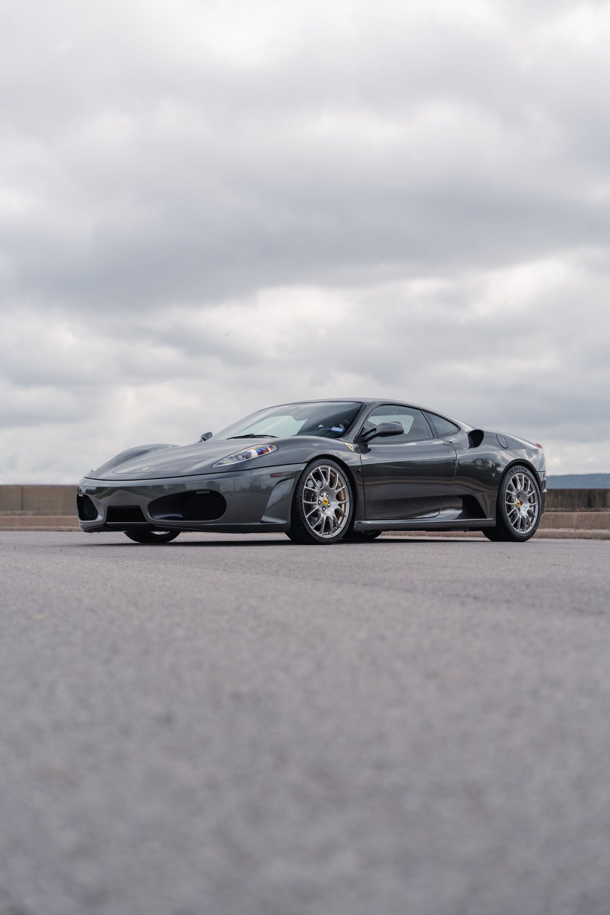 2007 Ferrari F430 6-speed in Grigio Silverstone with silver multi-spoke rims.
