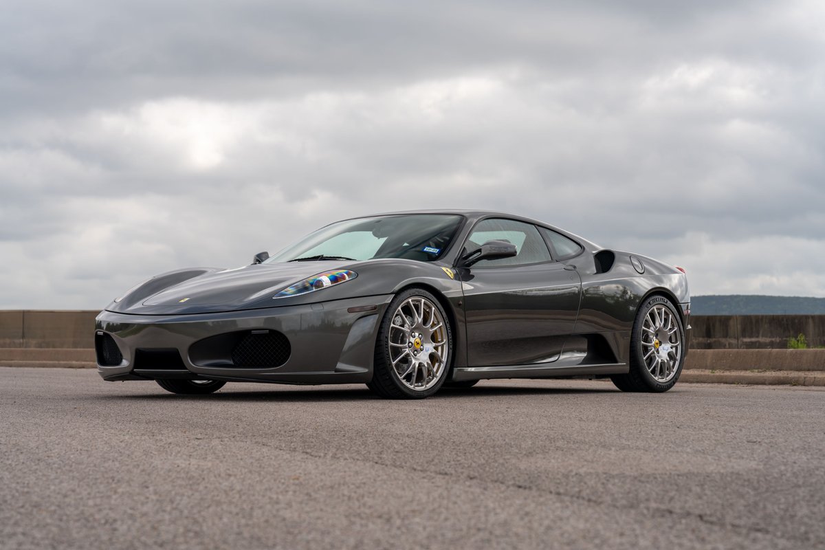 2007 Ferrari F430 in Grigio Silverstone with silver multi-spoke rims.