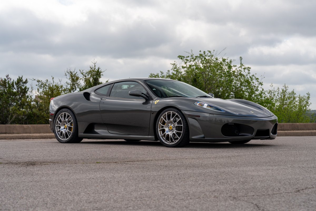 2007 Ferrari F430 in Grigio Silverstone, with multi-spoke alloy rims.