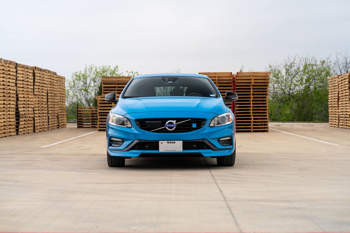 Rebel Blue 2015 Volvo V60 Polestar front view. Features performance trim and R-Design wheels.