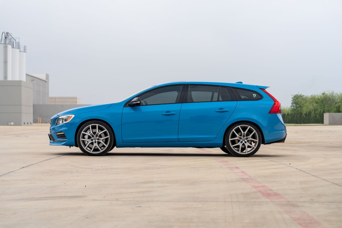 Rebel Blue 2015 Volvo V60 Polestar with silver multi-spoke rims.