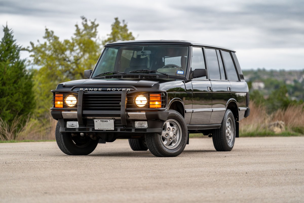 1994 Land Rover Range Rover County LWB in black, with chrome trim and five-spoke rims.