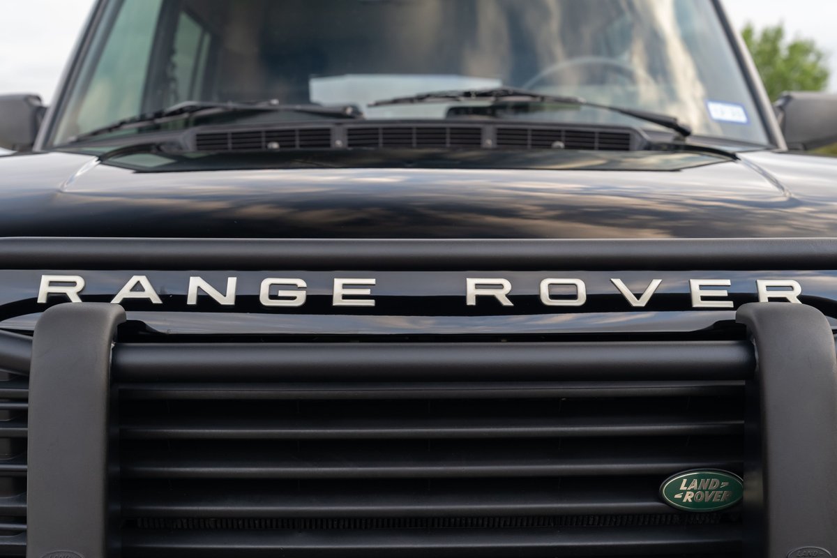Black 1994 Land Rover Range Rover County LWB grille with chrome "RANGE ROVER" badging.