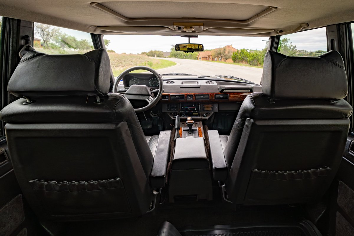 1994 Land Rover Range Rover County LWB interior, dashboard, leather seats, wood trim, center console.