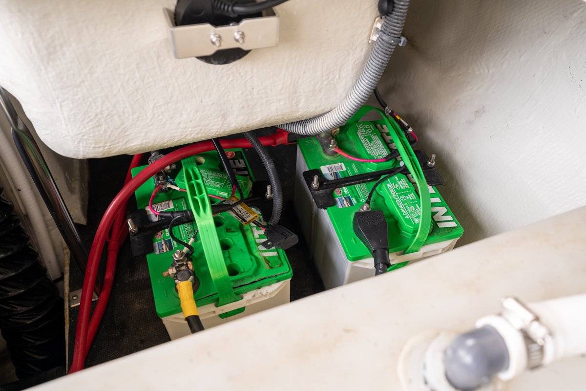 2018 Cobalt R7 Surf boat dual green marine battery bank with red and black wiring.