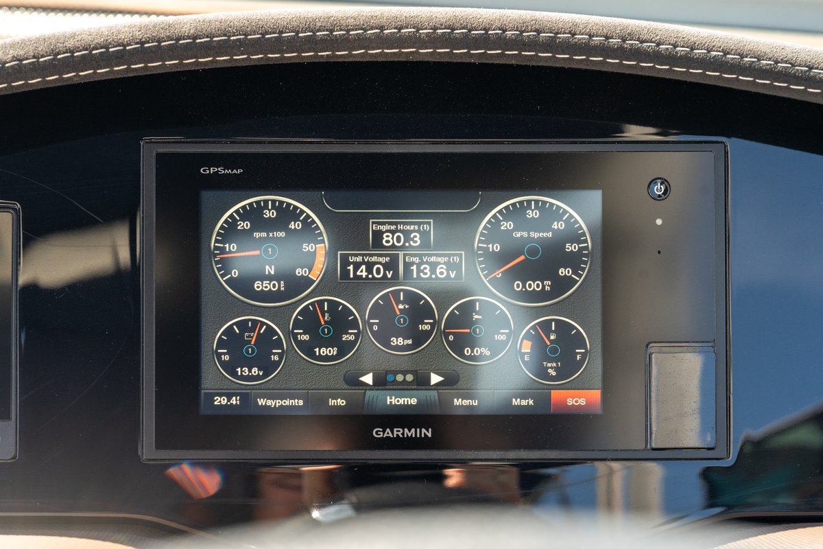 Garmin GPSMAP display on a 2018 Cobalt R7 Surf boat, showing engine gauges and voltage.