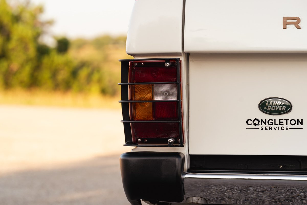 1995 white Land Rover Range Rover County rear detail with "R" trim and Congleton Service sticker.